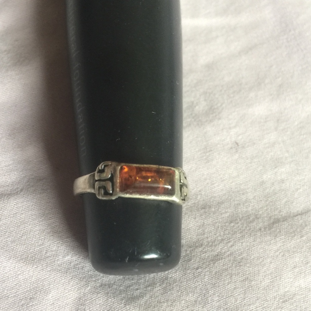 Silver and amber ring